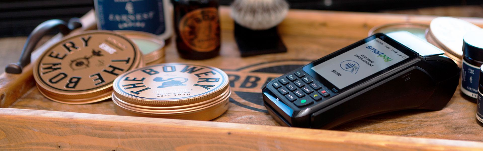 EFTPOS machine on barber shop counter