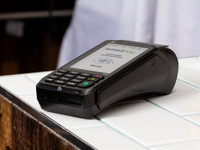 EFTPOS machine on table close up