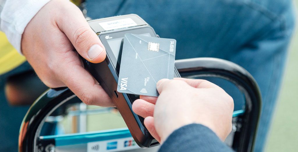 Card hover on EFTPOS machine screen to tap to pay