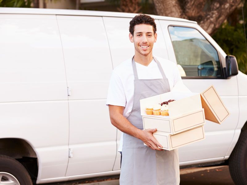 Cupcake delivery person with cupcake box