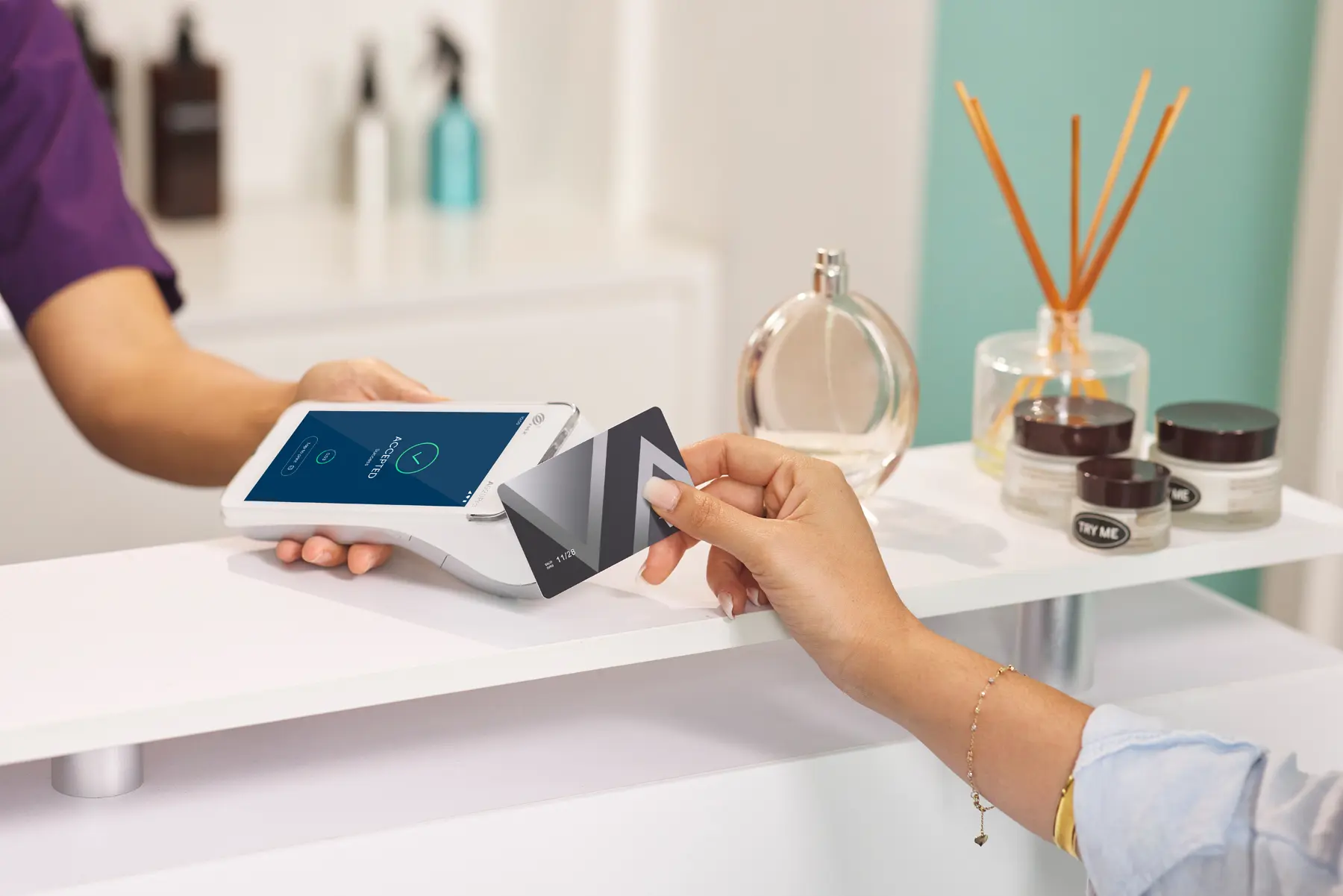 Hair and Beauty client making contactless payment in salon