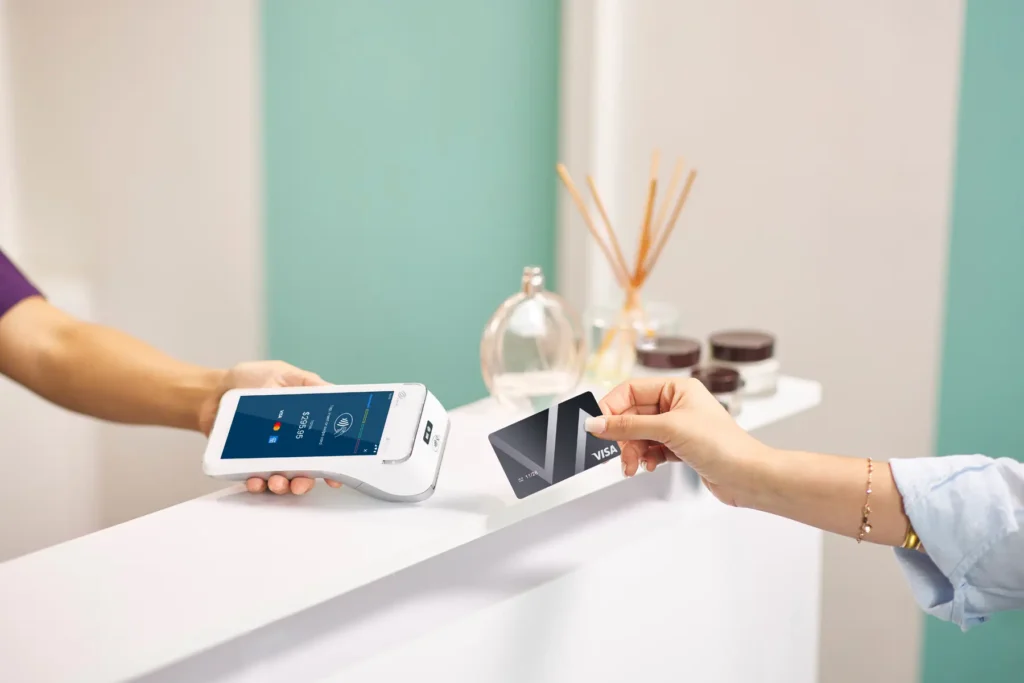 Hair and Beauty Customer making contactless payment through Smartpay A920Pro Terminal