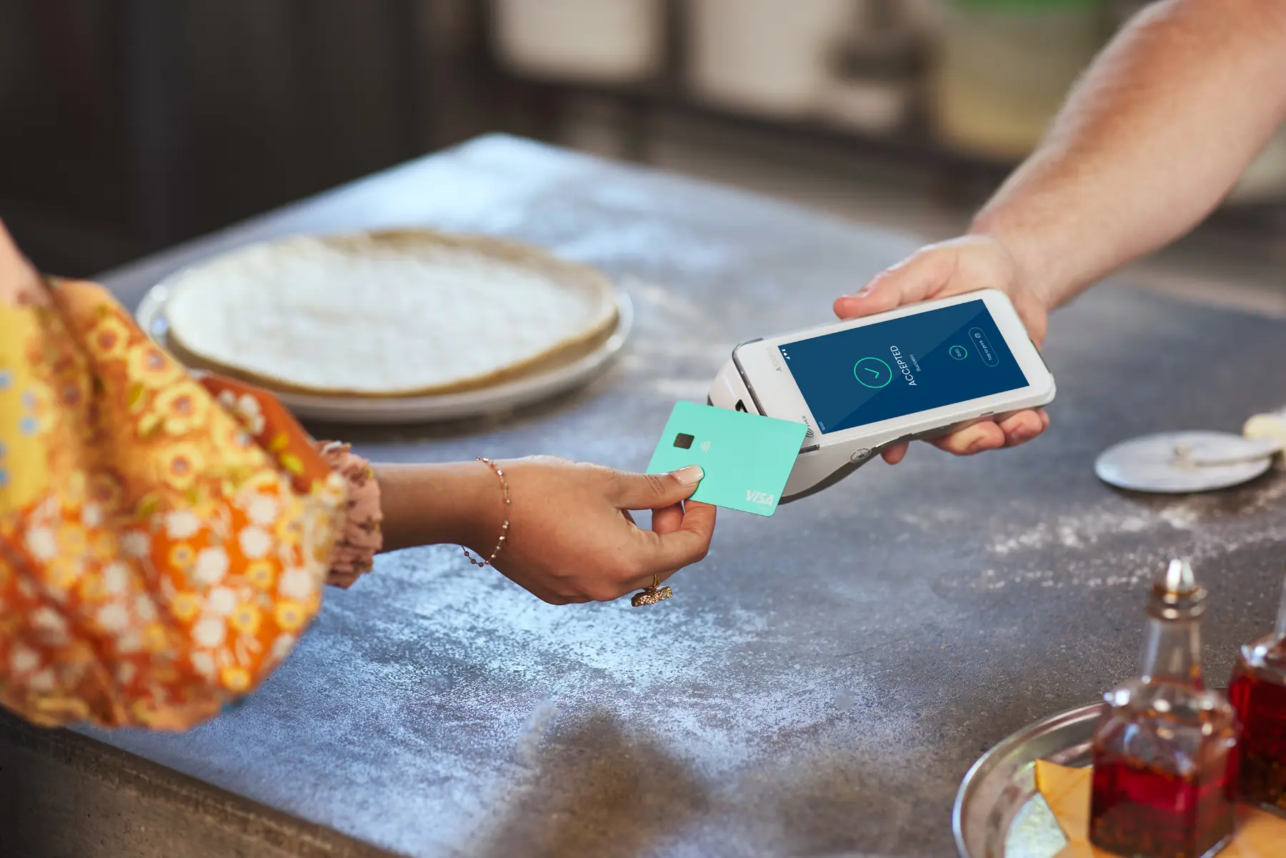 Pizza merchant receiving visa debit contactless payment success