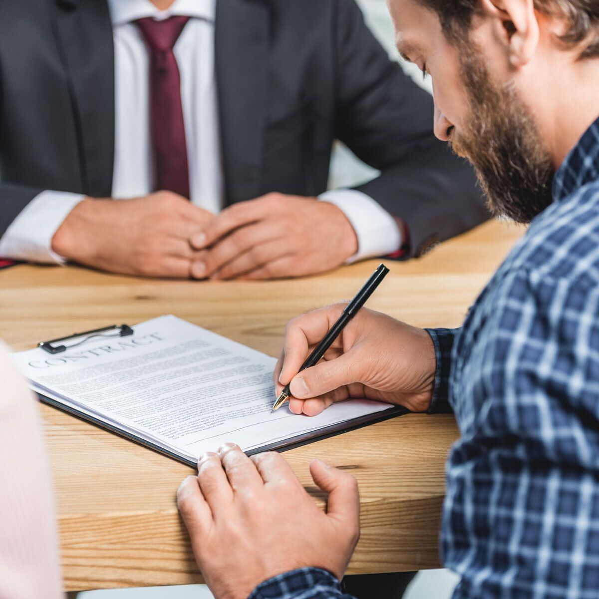 People discussing EFTPOS contract