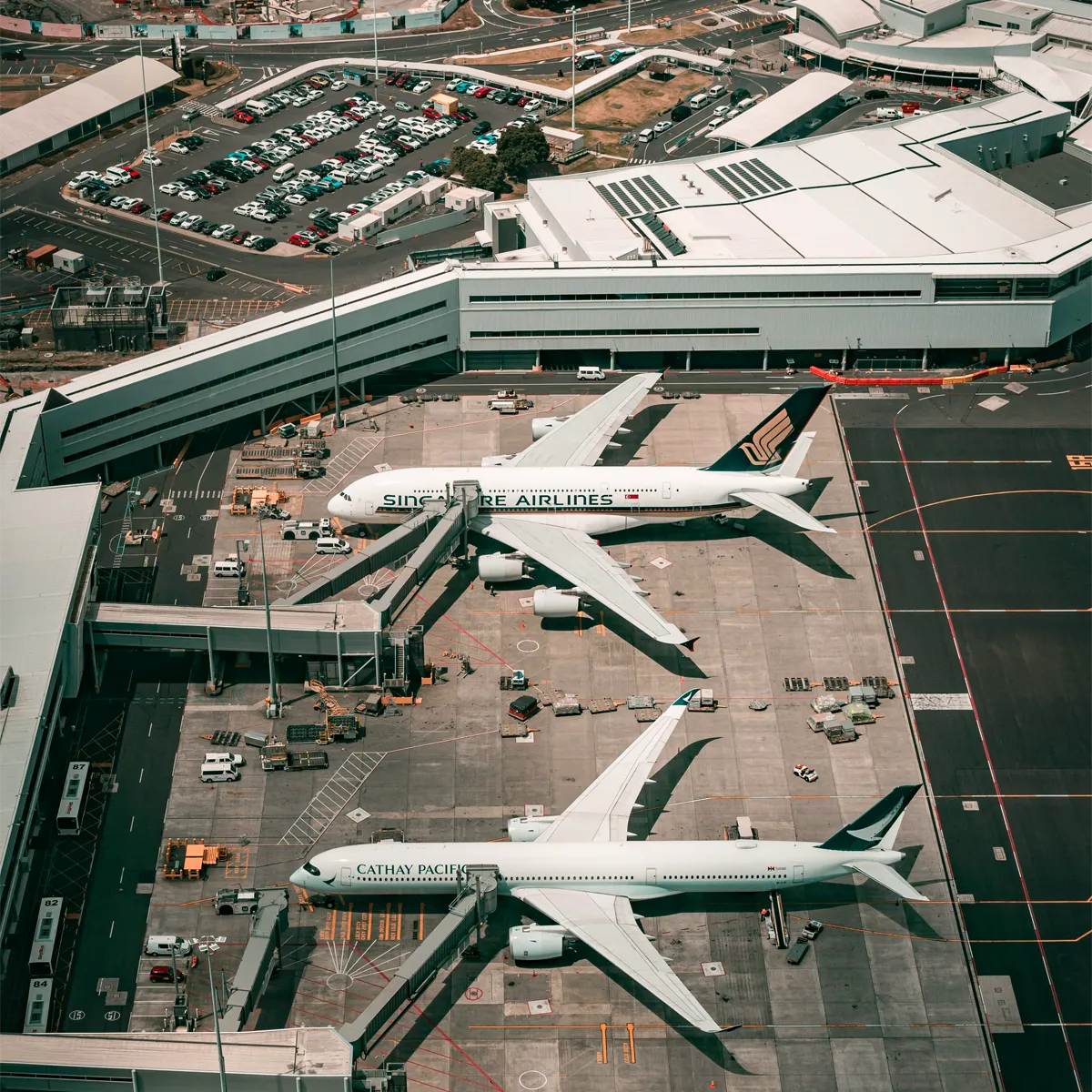 Birdseye view of Auckland airport showing two planes beside each other