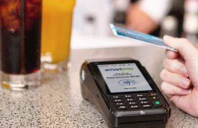 Contactless card payment on bar counter