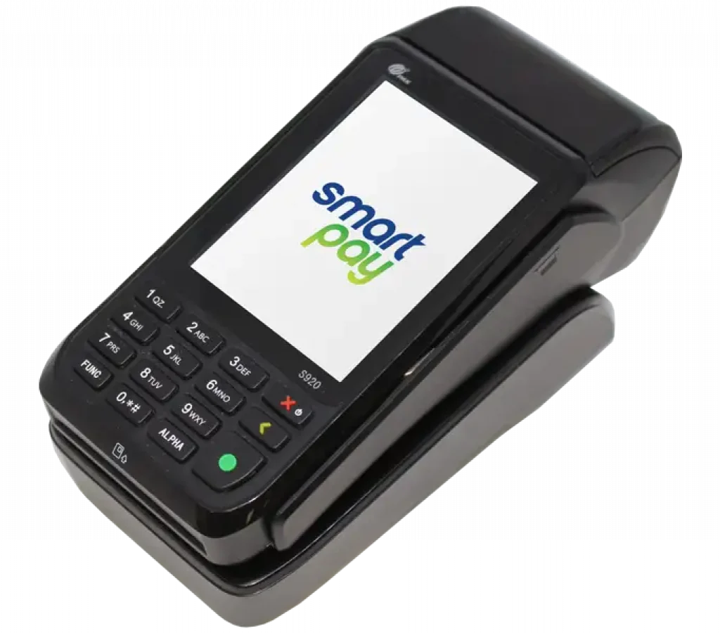 S920 EFTPOS terminal with Smartpay logo on charging base