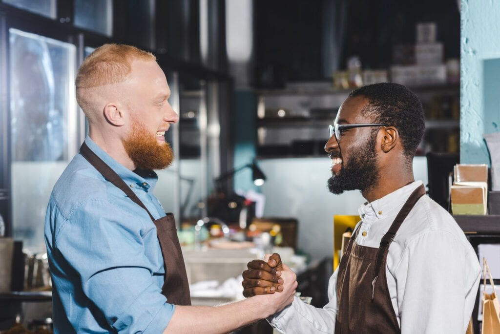 Two business owners shaking hands